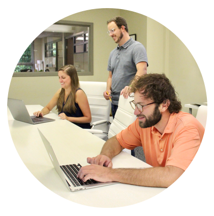 Homepage circle image our web design agency happy at work